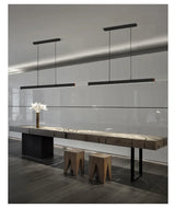 Minimalist modern chandelier—sleek strip light for dining rooms, bars, or office spaces.