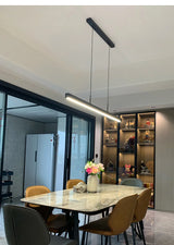 Minimalist modern chandelier—sleek strip light for dining rooms, bars, or office spaces.