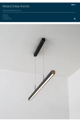 Minimalist modern chandelier—sleek strip light for dining rooms, bars, or office spaces.