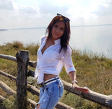 Women's linen long-sleeve white shirt—lightweight, stylish, and perfect for summer fashion."