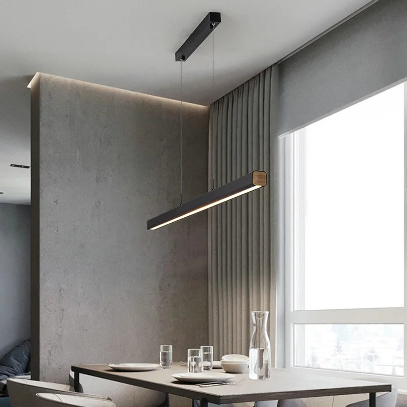 Minimalist modern chandelier—sleek strip light for dining rooms, bars, or office spaces.