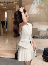 chic two-piece set—sleeveless tunic vest with high-waist pleated mini skirt, perfect for Korean summer