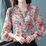 Elegant floral O-neck top with three-quarter sleeves—vintage-inspired, stylish, and perfect for summer.