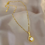 Chic gold pendant necklace with stainless steel link chain. Stylish, durable, and ships free."
