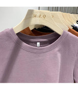 White cotton Y2K-style T-shirt for women—short sleeves, comfy fit, and perfect for spring