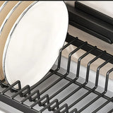 Wall-mounted no-hole kitchen dish rack—multifunctional storage for plates, chopsticks, knives, and cups."