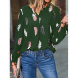 Elegant chiffon blouse with feather pattern—long sleeves and stylish design for a chic look.