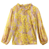 Elegant floral O-neck top with three-quarter sleeves—vintage-inspired, stylish, and perfect for summer.