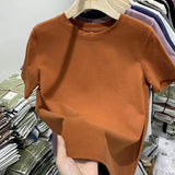 White cotton Y2K-style T-shirt for women—short sleeves, comfy fit, and perfect for spring