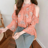 Elegant off-shoulder chiffon blouse—long sleeves and stylish design for a feminine, modern look.