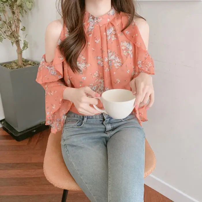 Elegant off-shoulder chiffon blouse—long sleeves and stylish design for a feminine, modern look.