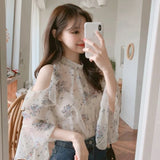 Elegant off-shoulder chiffon blouse—long sleeves and stylish design for a feminine, modern look.