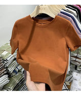 White cotton Y2K-style T-shirt for women—short sleeves, comfy fit, and perfect for spring