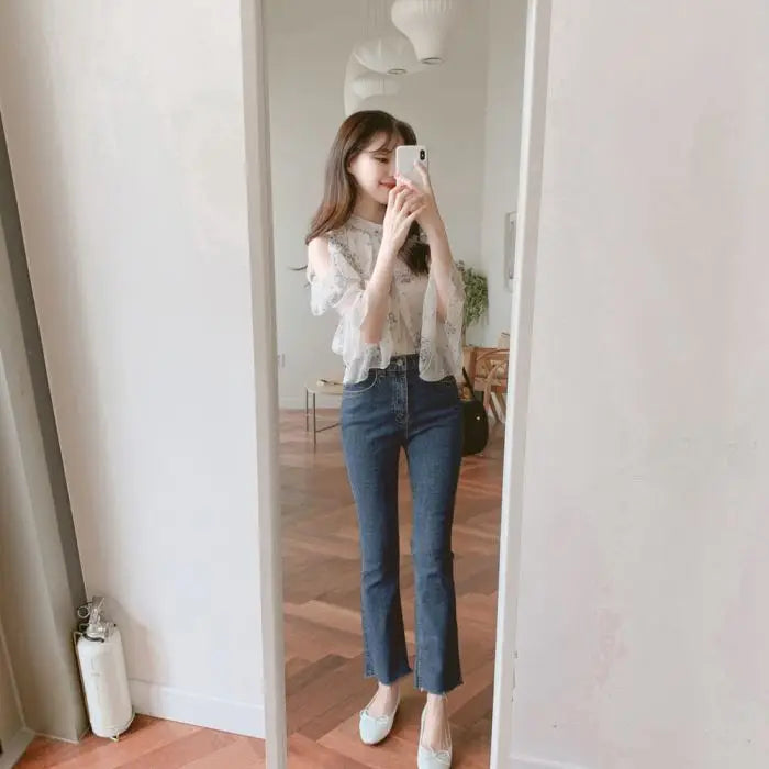 Elegant off-shoulder chiffon blouse—long sleeves and stylish design for a feminine, modern look.