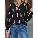 Elegant chiffon blouse with feather pattern—long sleeves and stylish design for a chic look.