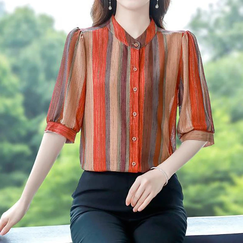 Elegant floral O-neck top with three-quarter sleeves—vintage-inspired, stylish, and perfect for summer.