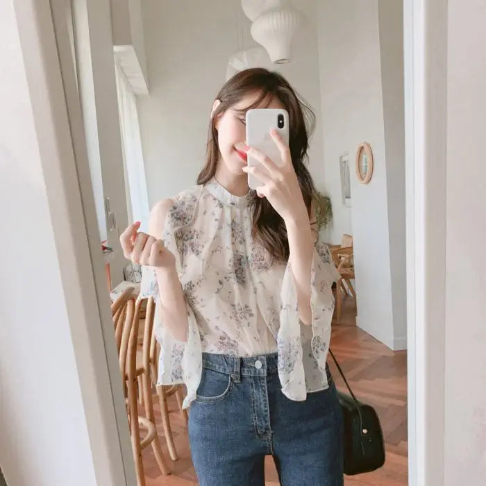 Elegant off-shoulder chiffon blouse—long sleeves and stylish design for a feminine, modern look.