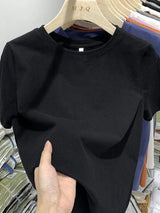 White cotton Y2K-style T-shirt for women—short sleeves, comfy fit, and perfect for spring