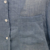 Women's linen long-sleeve white shirt—lightweight, stylish, and perfect for summer fashion."