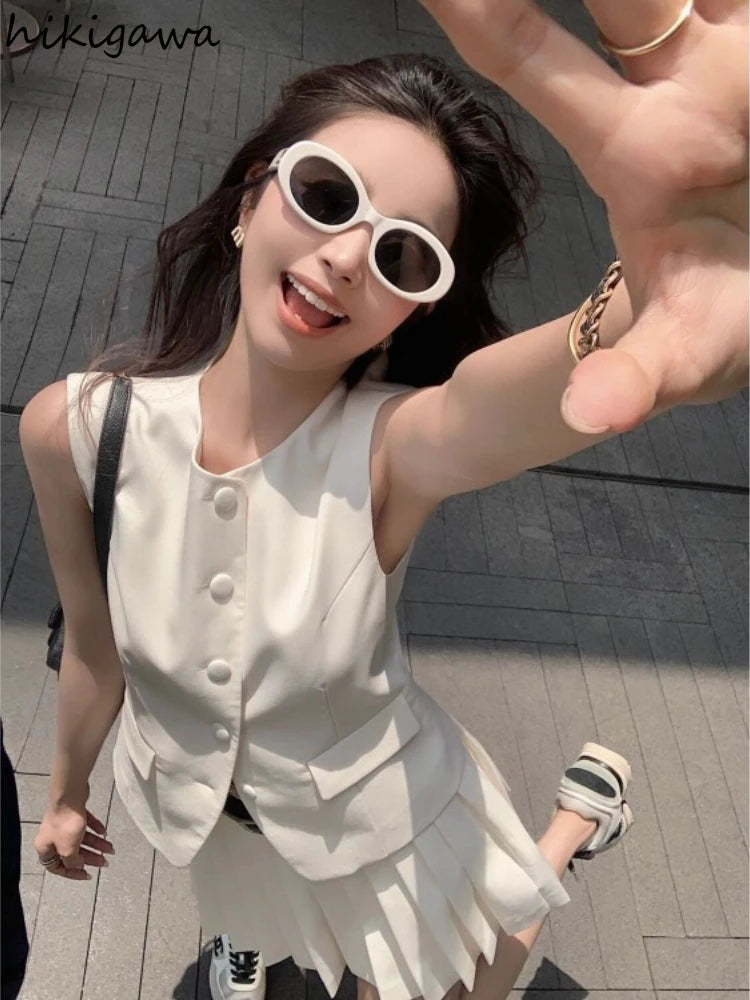chic two-piece set—sleeveless tunic vest with high-waist pleated mini skirt, perfect for Korean summer