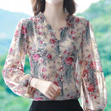 Elegant floral O-neck top with three-quarter sleeves—vintage-inspired, stylish, and perfect for summer.