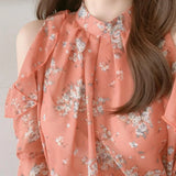 Elegant off-shoulder chiffon blouse—long sleeves and stylish design for a feminine, modern look.