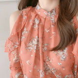 Elegant off-shoulder chiffon blouse—long sleeves and stylish design for a feminine, modern look.