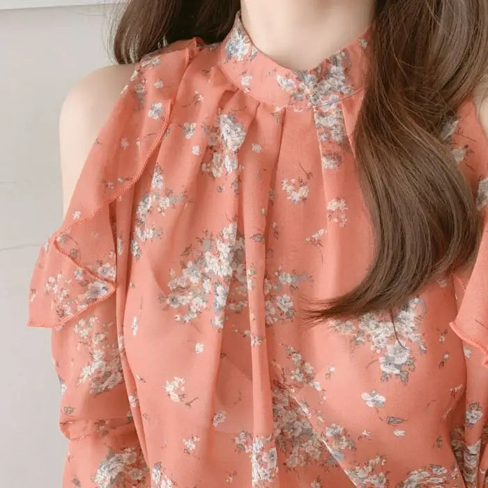 Elegant off-shoulder chiffon blouse—long sleeves and stylish design for a feminine, modern look.