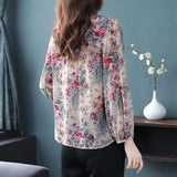 Elegant floral O-neck top with three-quarter sleeves—vintage-inspired, stylish, and perfect for summer.