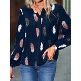 Elegant chiffon blouse with feather pattern—long sleeves and stylish design for a chic look.