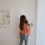 Elegant off-shoulder chiffon blouse—long sleeves and stylish design for a feminine, modern look.