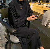Black crochet knit maxi dress—loose, stylish, and perfect for evening wear with a Y2K Harajuku vibe