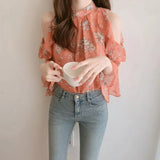 Elegant off-shoulder chiffon blouse—long sleeves and stylish design for a feminine, modern look.