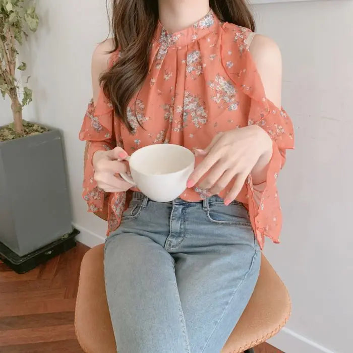 Elegant off-shoulder chiffon blouse—long sleeves and stylish design for a feminine, modern look.