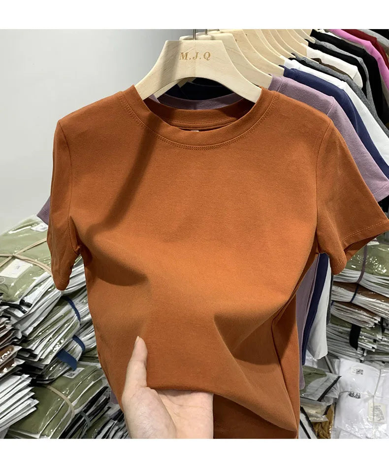 White cotton Y2K-style T-shirt for women—short sleeves, comfy fit, and perfect for spring