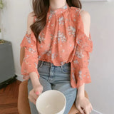 Elegant off-shoulder chiffon blouse—long sleeves and stylish design for a feminine, modern look.