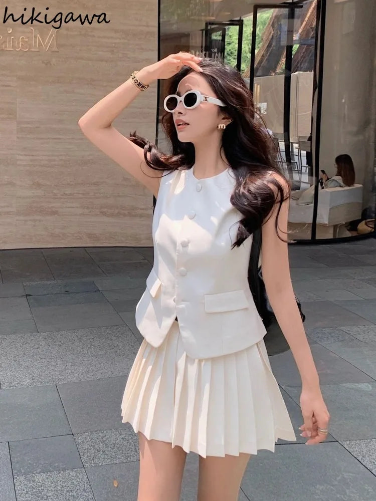 chic two-piece set—sleeveless tunic vest with high-waist pleated mini skirt, perfect for Korean summer