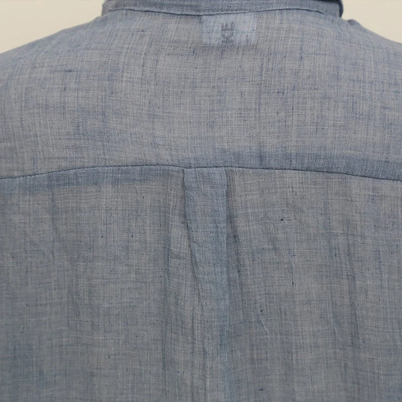 Women's linen long-sleeve white shirt—lightweight, stylish, and perfect for summer fashion."