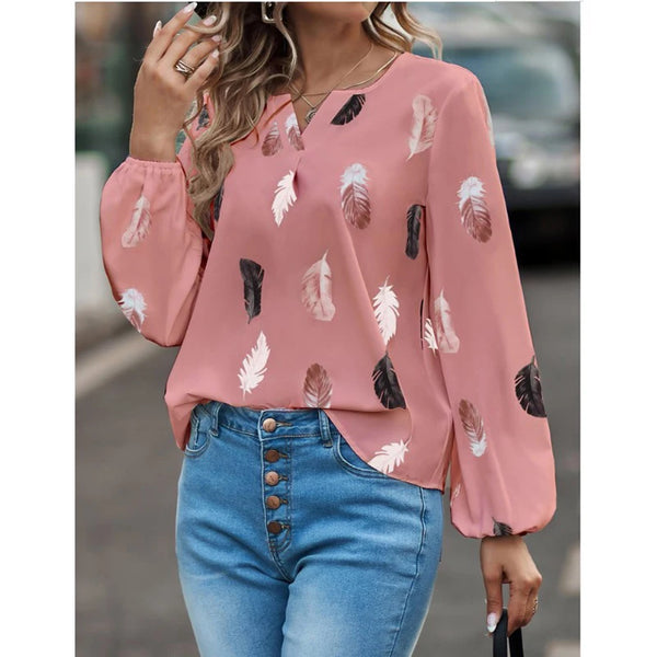 Elegant chiffon blouse with feather pattern—long sleeves and stylish design for a chic look.