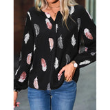 Elegant chiffon blouse with feather pattern—long sleeves and stylish design for a chic look.