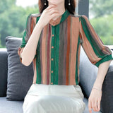 Elegant floral O-neck top with three-quarter sleeves—vintage-inspired, stylish, and perfect for summer.