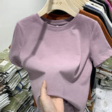 White cotton Y2K-style T-shirt for women—short sleeves, comfy fit, and perfect for spring