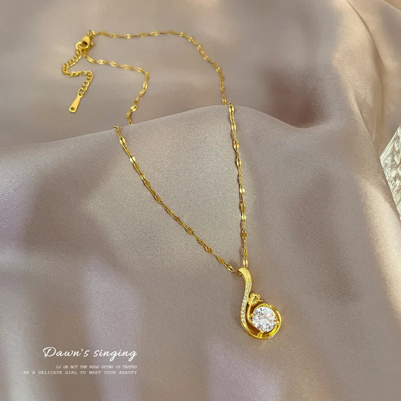 Chic gold pendant necklace with stainless steel link chain. Stylish, durable, and ships free."