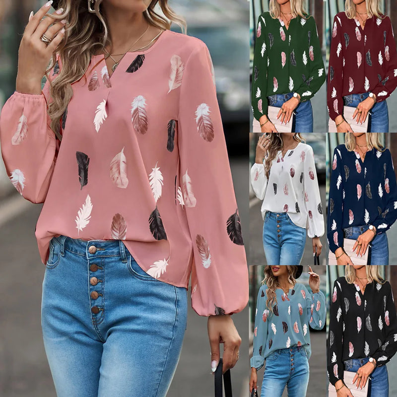 Elegant chiffon blouse with feather pattern—long sleeves and stylish design for a chic look.