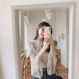 Elegant off-shoulder chiffon blouse—long sleeves and stylish design for a feminine, modern look.