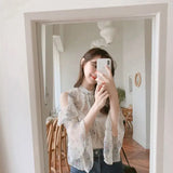 Elegant off-shoulder chiffon blouse—long sleeves and stylish design for a feminine, modern look.