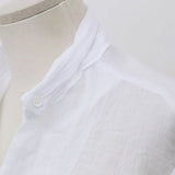 Women's linen long-sleeve white shirt—lightweight, stylish, and perfect for summer fashion."