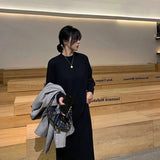 Black crochet knit maxi dress—loose, stylish, and perfect for evening wear with a Y2K Harajuku vibe