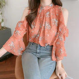 Elegant off-shoulder chiffon blouse—long sleeves and stylish design for a feminine, modern look.