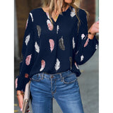 Elegant chiffon blouse with feather pattern—long sleeves and stylish design for a chic look.